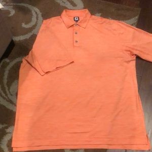 FootJoy golf shirt in bright orange.